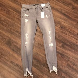 Grey distressed jeans. New!